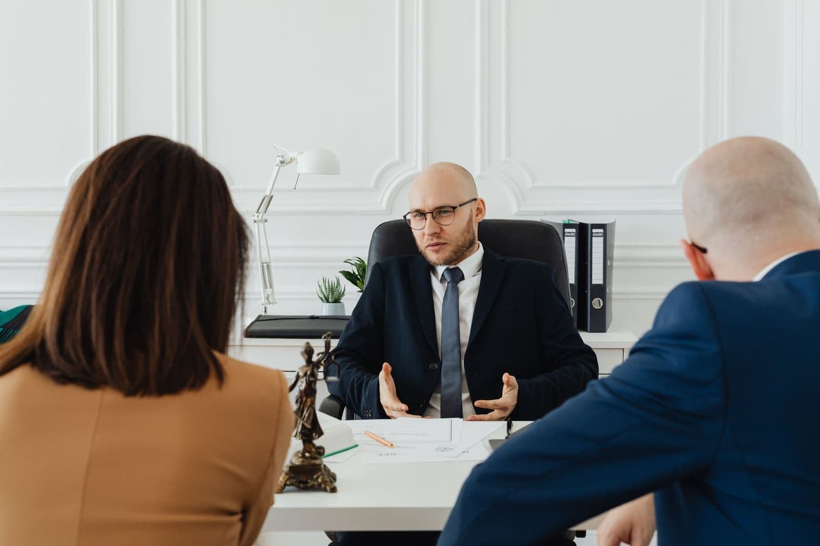 A licensed professional walking through policy numbers with a client